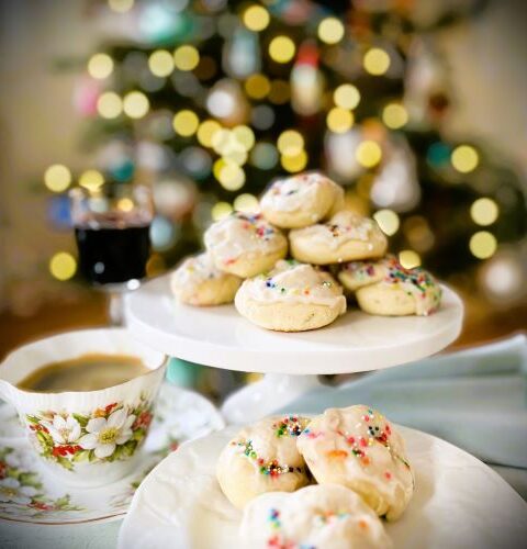 Gluten Free Sweet Italian Taralli Cookies with coffee and wine in front of a Christmas tree