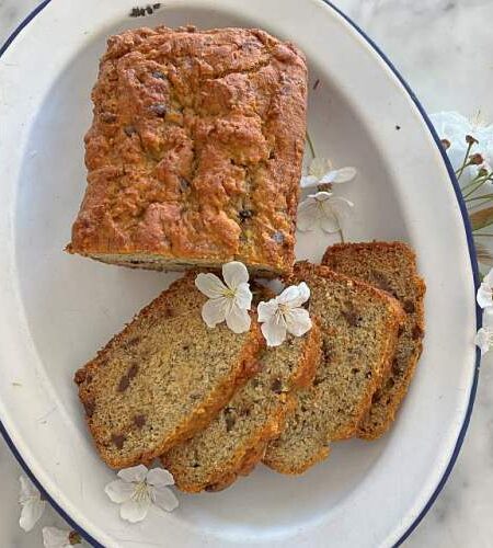 Gluten-free banana bread recipe, ready to serve on a platter.