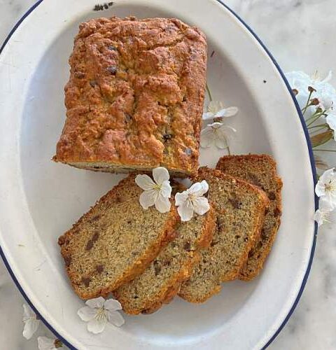 Gluten-free banana bread recipe, ready to serve on a platter.