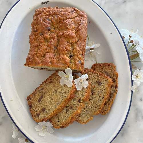 Gluten-free banana bread recipe, ready to serve on a platter.