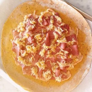 Gluten-Free Reuben Galette - Adding Sauerkraut