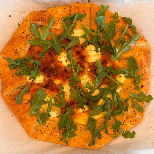 Gluten-Free Caramelized Onion and Arugula Galette - All dressed up