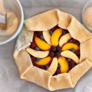 Gluten-Free Summer Berry Apple and Peach Galette - Folding the Galette