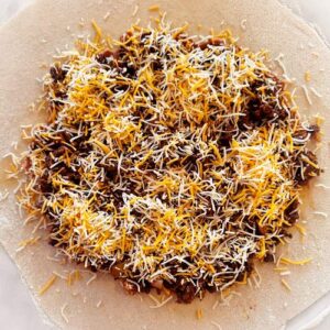 Gluten-Free Taco Salad Galette - Adding Layers Shredded Cheese