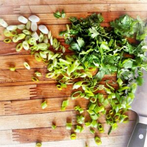 Gluten-Free Taco Salad Galette - Chopping Cilantro and Green Onions
